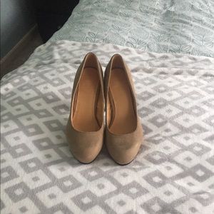 Beige suede pumps